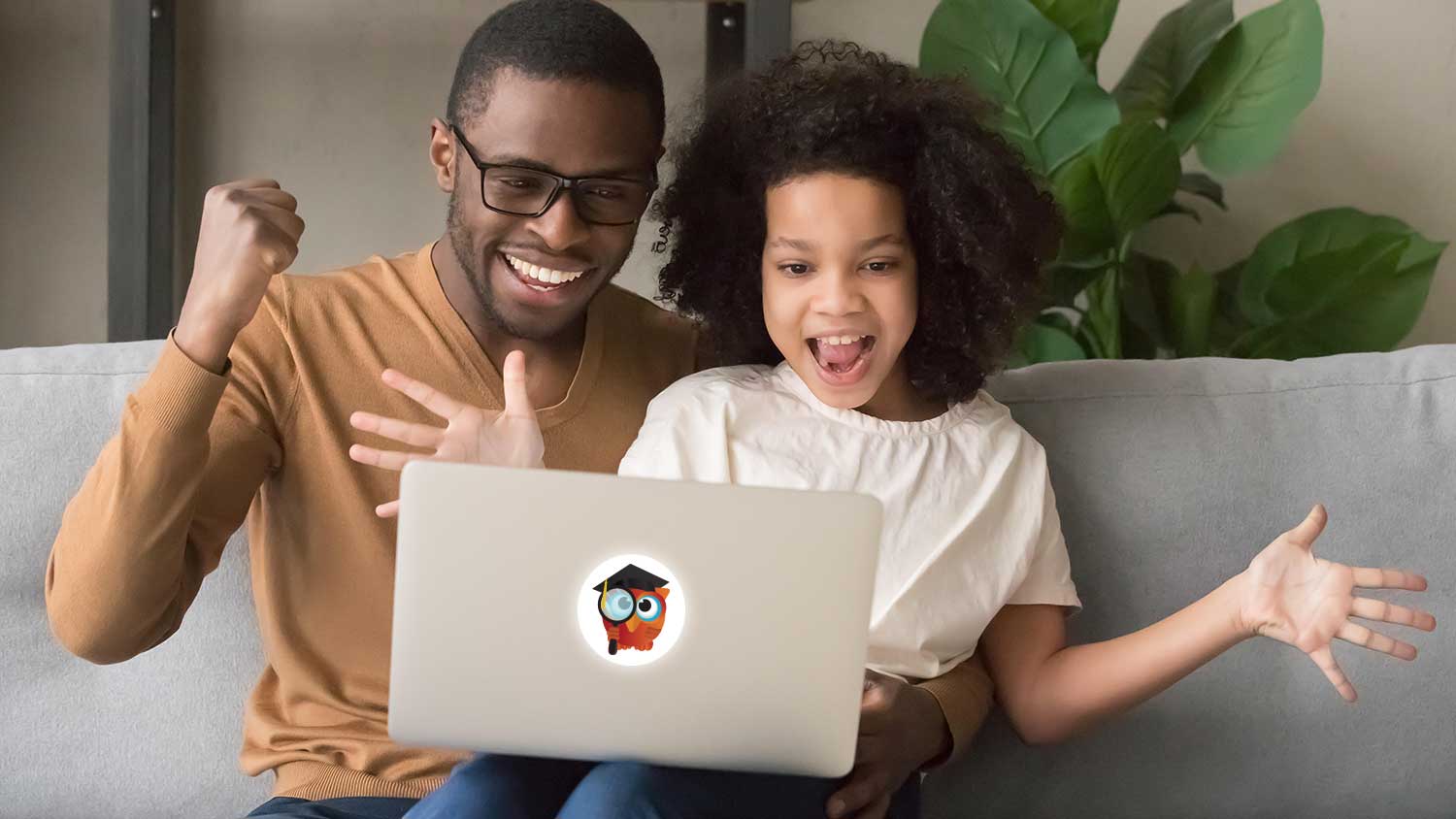 Parent and Child with laptop.